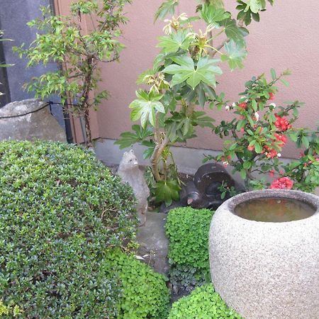 Daibutsu Ryokan Такаока Экстерьер фото